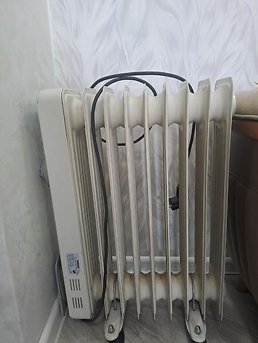 yağ sobası: Yağlı radiator tipli elektrikli isidici - 7 bölməli yağ radiatoru; — 1