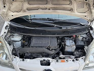 бу болон: Daihatsu Cuore: 2009 г., 1 л, Автомат, Бензин, Хэтчбэк — 10