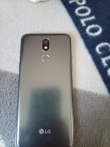 trimer za nausnice: Lg K40.Potpuno ispravan,ne baguje kamera mu je top.Telefon u odličnom — 3