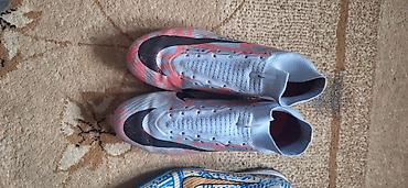 Бутсы: Набор футбольной обуви (разные модели и расцветки) В комплекте — 12