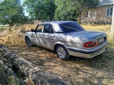 женские авто: Автомобиль ГАЗ Волга 3110, седан, светло-серого или серебристого