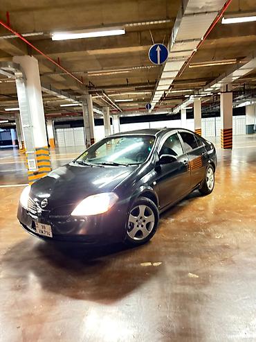 mini cooper kreditle: Nissan Primera: 2 l | 2005 il Sedan — 1