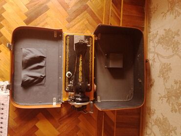 Qədim tikiş maşınları: Məhsul: Köhnə tip əl ilə işləyən tikiş maşını (daşınan model) Təsvir — 8