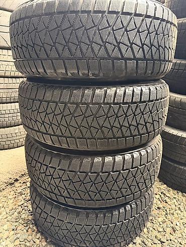 Комплект зимних шин Bridgestone Blizzak DM‑V2 - Размер: 235/55 R18 - at lalafo.kg Комплект зимних шин Bridgestone Blizzak DM‑V2 - Размер: 235/55 R18 -