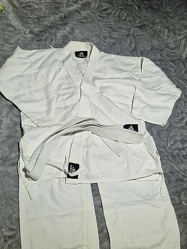 kombat şalvar: Karate paltarı yaxşı vəziyyətdədir. 11-13 yaş üçün uyğundur. hər — 2
