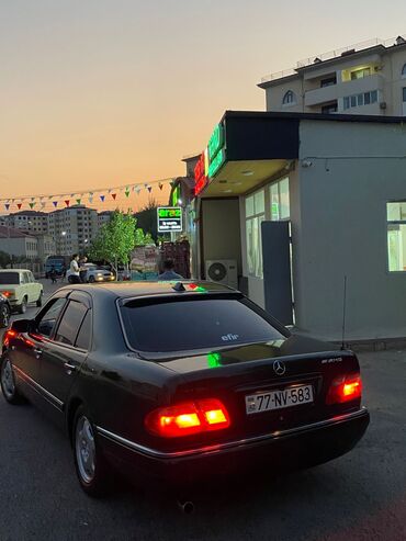 Mercedes-Benz E-Class: 2.3 л | 1996 г. Седан