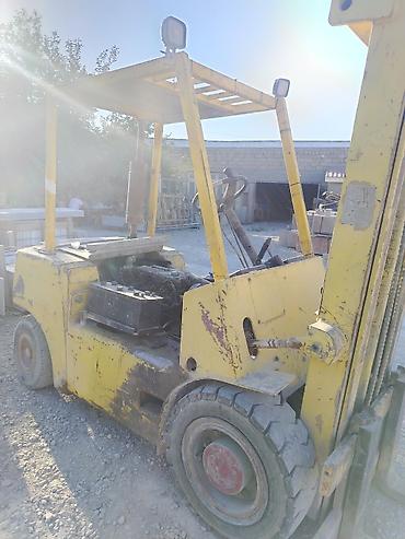 opel sukan: Sarı rəngli forklift (yükləyici) - Yanacaq tipi: daxiliyanma — 2