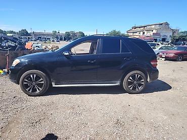 ag 07 sekilleri: Mercedes-Benz ML-Class (W164) SUV Xüsusiyyətlər: - Kuzov: 5 qapılı — 7
