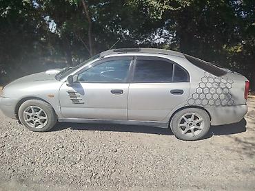 Транспорт: Mitsubishi Carisma: 1996 г., 1.8 л, Механика, Бензин, Седан — 4