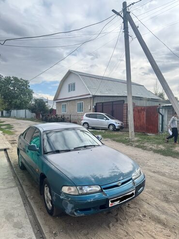 авто телега: Mazda 626: 1993 г., 1.8 л, Механика, Бензин, Хэтчбэк