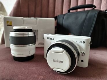 nikon d3200: Nikon j1 təci̇li̇ satilir!!! Pul lazım olduğuna görə bu qiymət