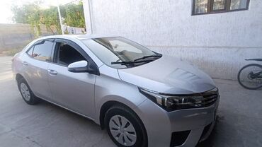 машина российский номер: Toyota Corolla: 2014 г., 1.4 л, Механика, Бензин, Седан