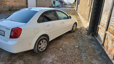 садовый измелчитель: Daewoo Gentra: 2013 г., Бензин, Седан