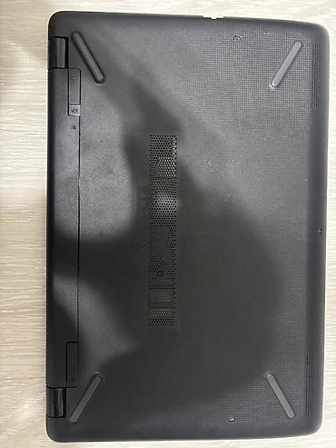 iphone 13 qiymetleri: HP noutbuk - Korpus: mat qara, xırda teksturalı səth; HP loqolu qapaq — 4
