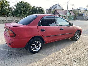 mazda 2000: Mazda 323: 1994 г., 1.6 л, Автомат, Бензин, Седан — 3