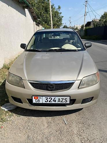 кпп «константиновка»: Mazda Familia: 2000 г., Автомат, Бензин, Седан — 3