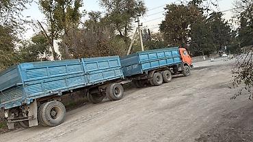 195 70 с: КамАЗ самосвал с прицепом (автопоезд) Описание: - Тягач КамАЗ — 1