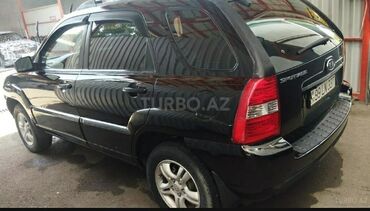 Kia: Kia Sportage – qara rəngli kompakt SUV Xarici: - Qara kuzov, 5 qapı - — 11