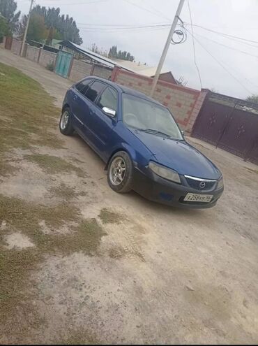 машина спортивный: Mazda Familia: 2002 г., 1.5 л, Автомат, Бензин, Хетчбек