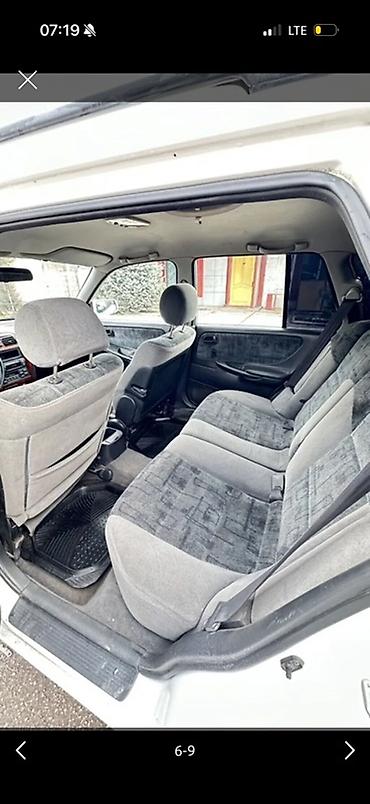мини электро: Mazda 626: 1999 г., Универсал — 6