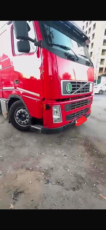 полик 124: Тягач, Volvo, 2002 г., Бортовой — 2