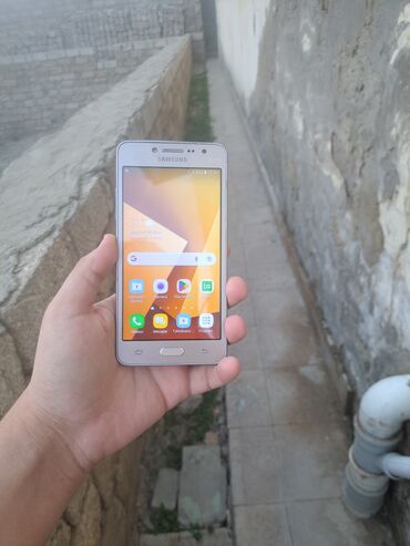 телефон флай красный: Samsung Galaxy J2 Prime, 16 GB, rəng - Qızılı, Sensor