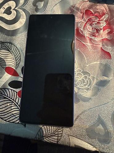 irşad 15 pro: Redmi Note 13 Pro, 256 GB, rəng - Bənövşəyi, Sensor — 2