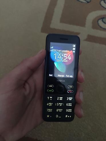 nokia kohne modeller: Nokia 700, rəng - Qara, Düyməli — 1