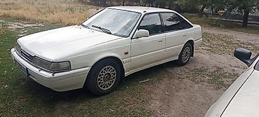 w210 430: Mazda 626: 1990 г., 2 л, Механика, Бензин, Седан — 1