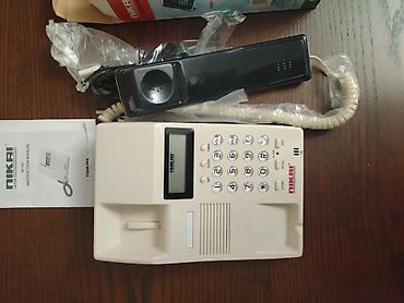 wo long: Nikai NT-353 masaüstü telefon Xüsusiyyətlər: - Speakerphone — 3