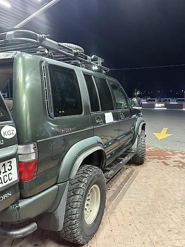 Унаа: Isuzu Bighorn: 2002 г., 3.5 л, Автомат, Бензин, Жол тандабас — 6