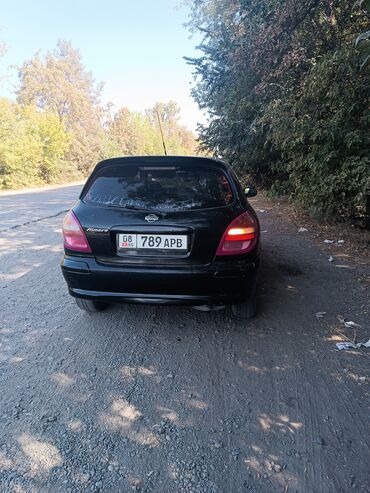 Nissan: Nissan Almera: 2000 г.