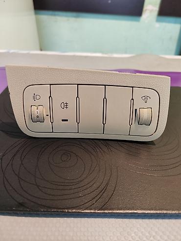 knopka: Avtomobil üçün ön panel işıqlandırma və idarəetmə bloku. Bu hissə — 4