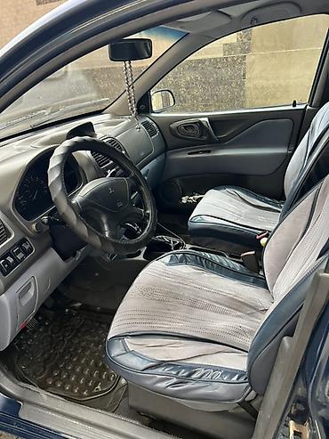 машины камри: Mitsubishi Space Star: 2001 г., 1.3 л, Механика, Бензин, Хэтчбэк — 9