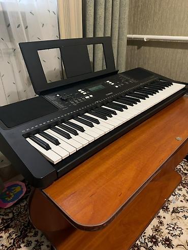 Синтезаторы: Продаю б/у Yamaha PSR-E373, состояние отличное. Все клавиши, кнопки — 3