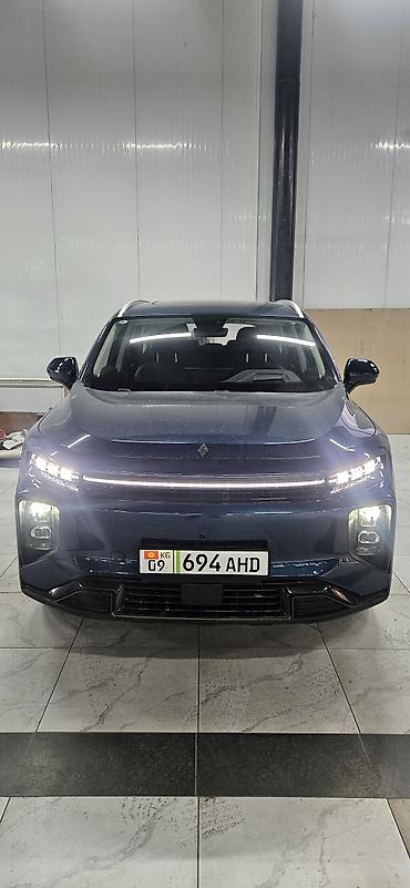 Другие автомобили: Кроссовер 7 мест, темно-синий цвет кузова. новый Основные — 1