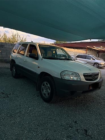 четырка цена: Mazda Tribute: 2004 г., 2 л, Механика, Бензин, Кроссовер — 1