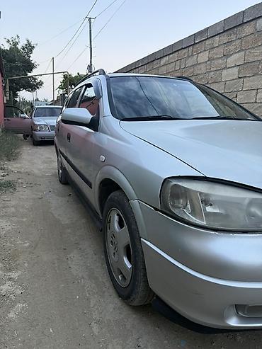 opel təkərləri: Opel Astra G (universał) – gümüşü rəng Texniki və komplektasiya: - — 3