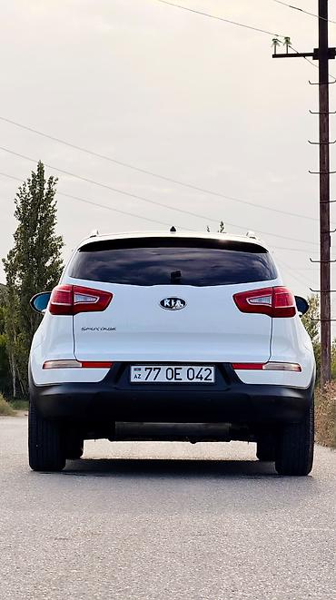 kreditle avtomobiller: Kia Sportage: 0.1 l | 2011 il — 1