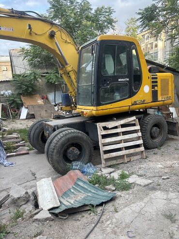 бур для трактора: Экскаватор, Komatsu, 2009 г., Колесный