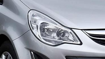 kurac: FAROVI ZA OPEL CORSA D OD 2011. DO 2014. GOD. | Polovni originalni — 1