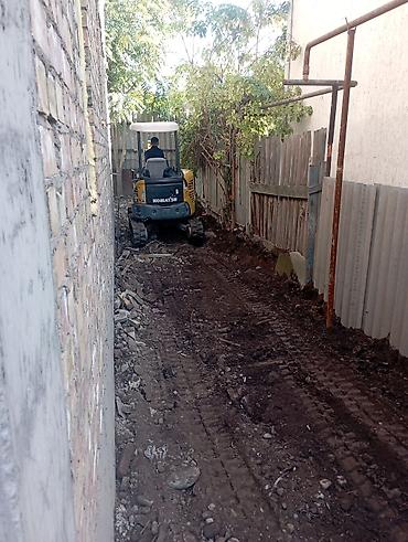 Аренда экскаватора: Мини-экскаватор Komatsu PC09-1 с доставкой на объект порадую портери — 16