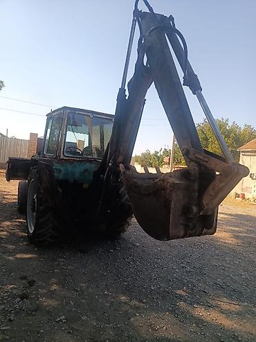 Kommersiya nəqliyyat vasitələri: Ekskavator-yükləyici traktor - Ön hissədə iri yükləmə kovası, arxa — 6