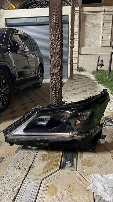 насадка на выхлоп: Передняя левая фара Lexus Б/у, Оригинал — 2