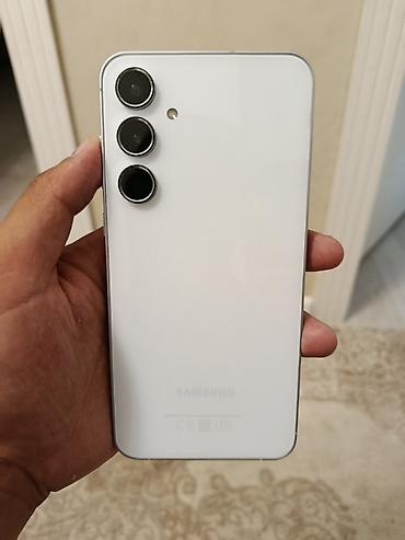 a 23: Samsung Galaxy А 55(белый) - Экран 6.1", AMOLED, тонкие рамки — 4