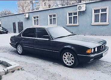 mercedes e class: BMW 7 series: 3.5 l | 1991 il Sedan — 8