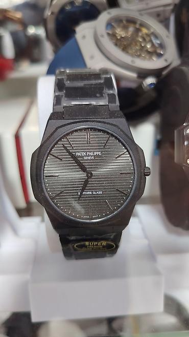 patek philippe saat: Patek Philippe üslubunda kişi qol saatları – qara tonlarda klassik — 6