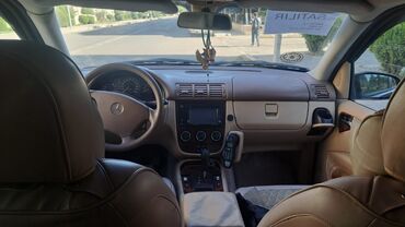 Mercedes-Benz: Mercedes-Benz ML 320: 3.2 l | 2003 il Ofrouder/SUV — 4