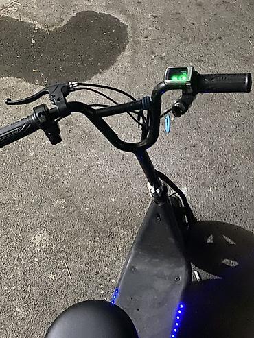 Электротранспорт: Oturacaqlı elektrik skuter -saatda 20 km surerle hereket edir — 5
