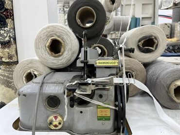 Digər istehsal avadanlığı: Xalça kənarı vurma (overlok) avadanlığı və iri həcimli sap bobinləri — 8